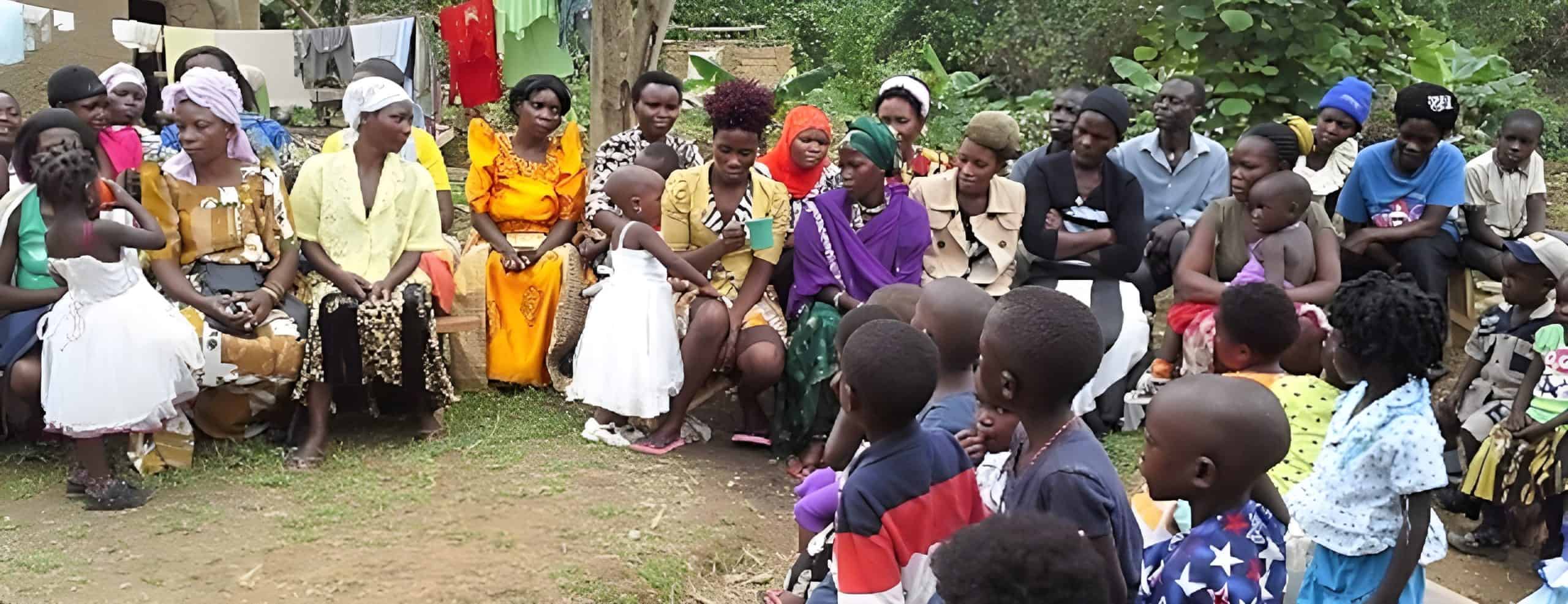 Children and women participating in a community outreach event organized by Pearl Global Ministries in an outdoor setting. The image highlights faith-based charity work, community support, and humanitarian aid in Africa.