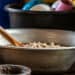 Community kitchen scene with fresh vegetables, cooking utensils, and food preparation tools at Pearl Global Ministries.